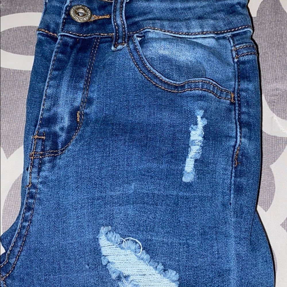 Ripped Skinny Blue Jeans
